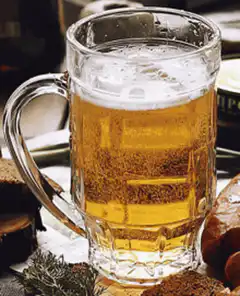 Frothy beer mug with bubbles