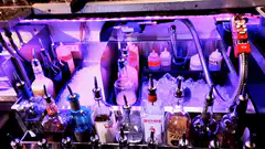 Bar counter with liquor bottles and ice