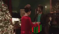 Woman opens gift and smiles