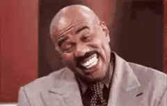 Steve Harvey distorted laughing face