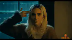 Billie Eilish finger gun to head