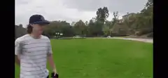 man swinging baseball bat