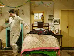 Man dancing in bedroom