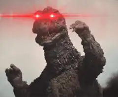 Godzilla with glowing red eyes