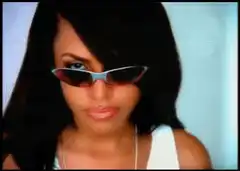 Aaliyah takes off sunglasses