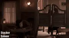 Cowboy enters saloon while man sleeps