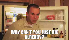 Man yelling at fridge why can't you just die already