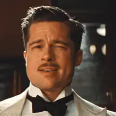 Brad Pitt winking and smiling