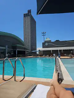 poolside view with tall building