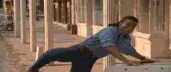 Man kicks motorcycle off its wheels
