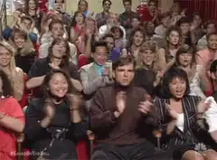 Cliff Clavin clapping in the audience