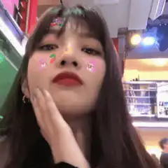 Girl with cute face stickers posing