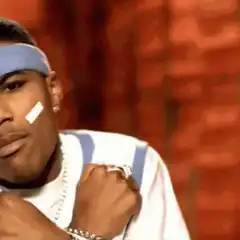 Chris Tucker nodding with a bandage