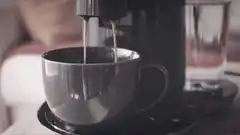 coffee machine pouring into cup