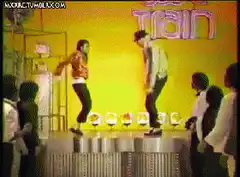 Two men dancing on a stage