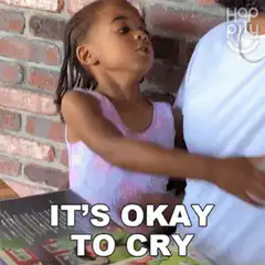 Little girl hugs dad it's okay to cry