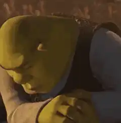 Shrek smirking and looking up