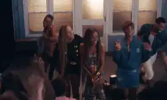 Group of friends dancing at a party