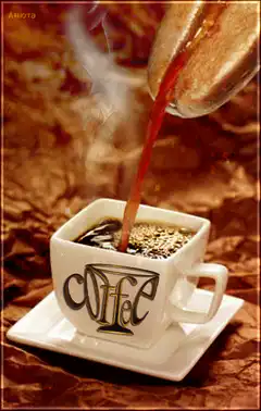 Coffee being poured into a cup