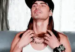 Man with long hair and no regrets tattoo