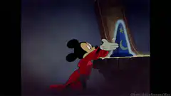 Mickey Mouse puts on sorcerer hat