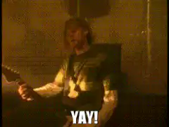 Nirvana band playing with YAY text
