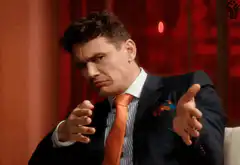 James Franco shrugging