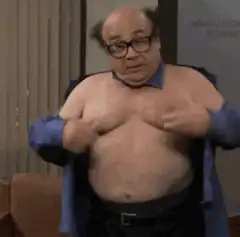 Danny DeVito opens his shirt