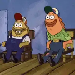 Two fish laughing on chairs