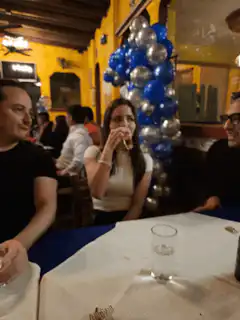 woman drinking beer at party