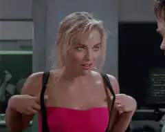 Sharon Stone shrugs in pink top