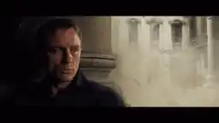 Daniel Craig as James Bond watching explosion
