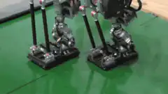Robot legs walking on green screen