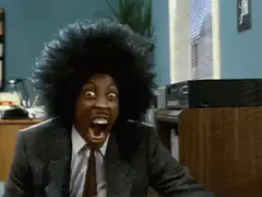 Woman screaming with big afro