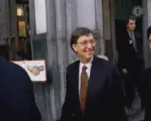 Bill Gates gets hit with a sign