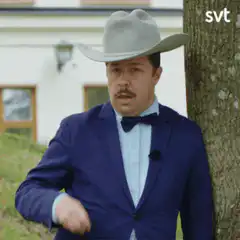 Man in cowboy hat tips brim