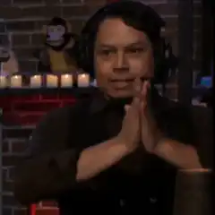 Man doing hand gestures with headphones