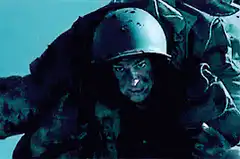 Soldier grimacing in helmet