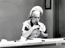 Woman eating and reacting with shock