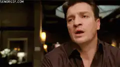Nathan Fillion as Rick Castle shrugs