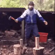 man chops wood with one kick