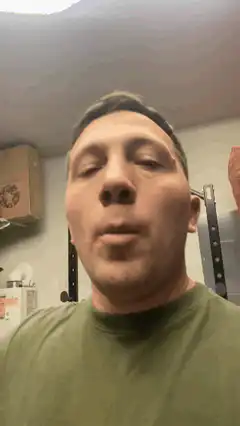 Man chewing with eyes closed