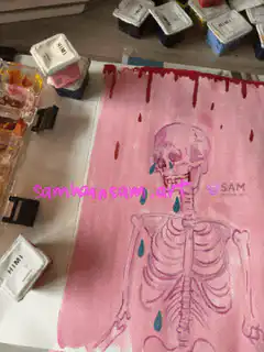 Pink skeleton crying blue tears