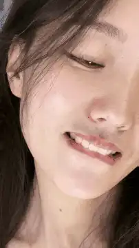 woman smiling and looking up