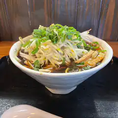 steaming bowl of ramen with bean sprouts