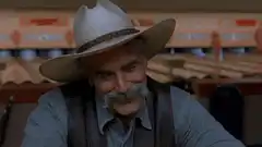 Sam Elliott nodding and smiling