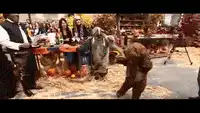 Baby Yoda dancing at a pumpkin patch