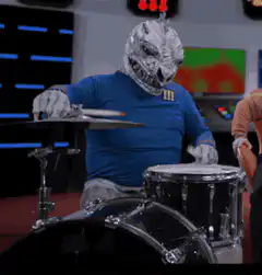Alien drummer playing drums
