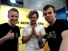 Three men posing with funny faces