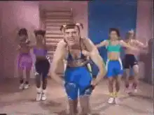 Man in bikini doing aerobics